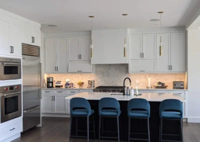 Kitchen cabinets that were refinished and painted in an Alberta kitchen by FHG Contracting