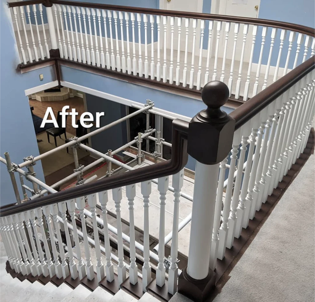 a staircase in a nice home that had its rails steps and banisters painted by fhg contracting in beaumont alberta canada