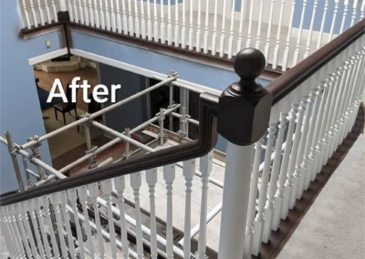 a staircase in a nice home that had its rails steps and banisters painted by fhg contracting in beaumont alberta canada