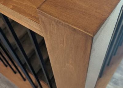 Staircase in Canada with wood refinished and stained by FHG Contracting